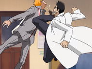 Ichigo is kicked by Isshin Kurosaki for being late.