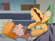 Kon wakes Ichigo.