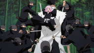 Yachiru dodges attacks.