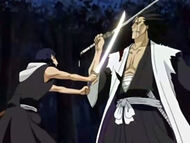 Kenpachi blocking maki's attack