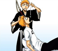 Ichigo drops Kon's pill into his body's mouth.