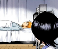 Rukia stays in Ichigo's room as he sleeps.