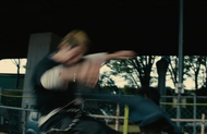 Yasutora Sado punches one of the teenagers away.