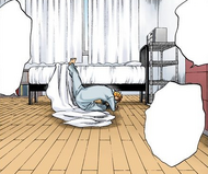 Ichigo falls out of bed due to a dream.