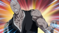 Ikkaku uses his muscles to pop his dislocated shoulder back into place.