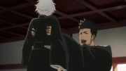 Isshin cargando a Toshiro.