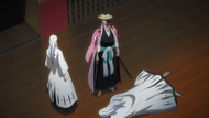 Two Reigai standing over the real, but injured, Ukitake.