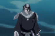 Byakuya stands with a wound across his left shoulder.