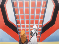 Rangiku and Hitsugaya have their path blocked by the defense system.