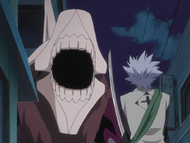 Hitsugaya finds himself confronted by the disguised Arrancar clone.