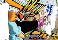 Isshin greets Ichigo with a dropkick.