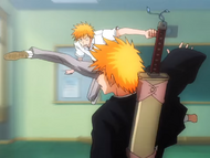 Kon sends Ichigo flying.