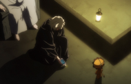 Kon watches as Urahara analyzes Inaba's blood.