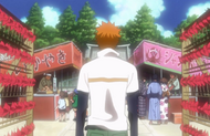 Ichigo sees a festival hidden behind an enclosed space.