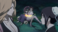 Momo and Rangiku stand over their trapped Zanpakutō.