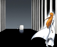 Orihime sees Ulquiorra return from the pocket dimension at the other end of the hall.