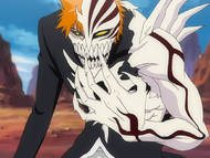 Zangetsu Hollowfies Ichigo's left arm after Kensei damages it.