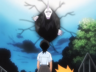 Rukia watches the Menos Grande emerge.