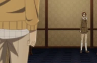 Ryūken stops Masaki when she begins running out of the house to intervene in the ongoing battle between Isshin and White.