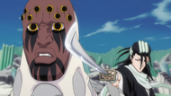 Byakuya holds his sword next to Zommari's head.