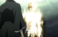 Ichigo reverts to his normal form as Rukia tries to warn him.