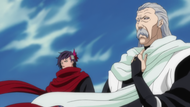 Ginrei pulls down the scarf covering his mouth.