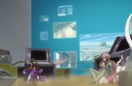 Saru, Hebi, and Senbonzakura arrive in a room filled with computers and machines.