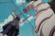 The Hollow pins Haruko to the fence.