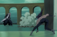 Yoruichi evades the blow.