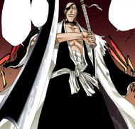 Kenpachi draws his own Zanpakutō while pushing back Zangetsu with his bare arm.