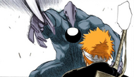 The Hollow attacks Ichigo.