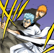 Ichigo evades Grimmjow's punch by moving behind him.