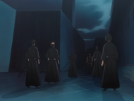 Koga is confronted by five Shinigami.