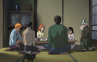 Kisuke Urahara drinks his tea as the others remain silent.