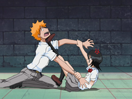 Rukia restrains Kon.