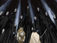 Rukia and Ashido are ambushed by dozens of Menos Grande.