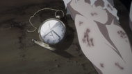 Giriko's watch next to his corpse.