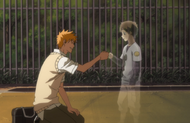 Ichigo and the dead boy fist-bump after the latter agrees to move on to Soul Society for the sake of his parents.