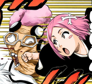 Yachiru punches Guenael.