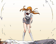 Orihime stands up to confront Yammy.