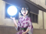 Rukia easily channels her Reiryoku into the palm of her hand.