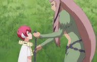 Saru detaches the chain from Hebi's collar.