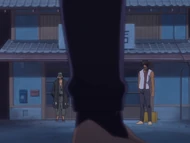 Ichigo finds Sado and Urahara standing outside the Urahara Shop.