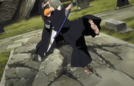 Ikkaku attacks Ichigo with a powerful slash.