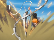 Ichigo is blown back by Renji's attack.