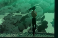 Yoruichi observes Yushima's destructive power.