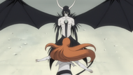 Ulquiorra prevents Orihime from getting to Ichigo's side.