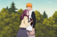 Haruko hugs Ichigo after mistaking him for Kon.