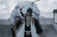 Kenpachi holding three defeated Sternritter.