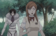 Muramasa appears behind Orihime.